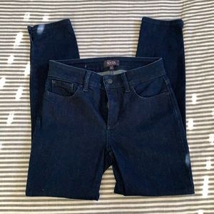 Dark wash NYDJ jeans.